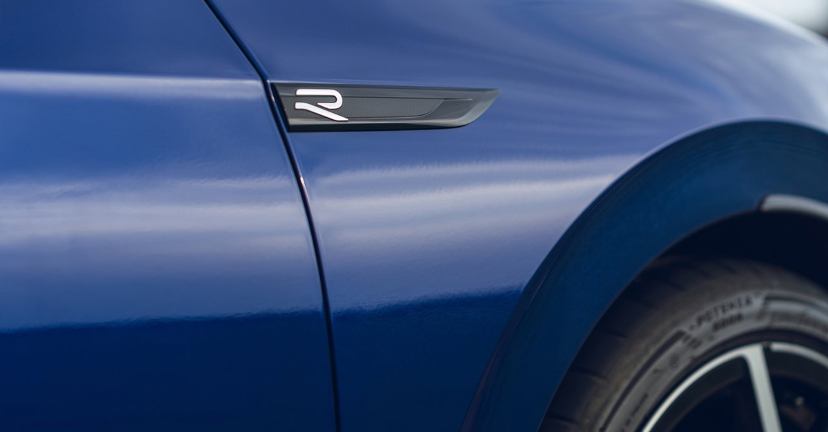 Close-up of a blue car with solid paint